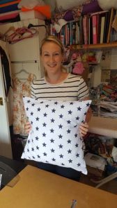 private sewing lesson student Lucy with her first project, a cushion cover