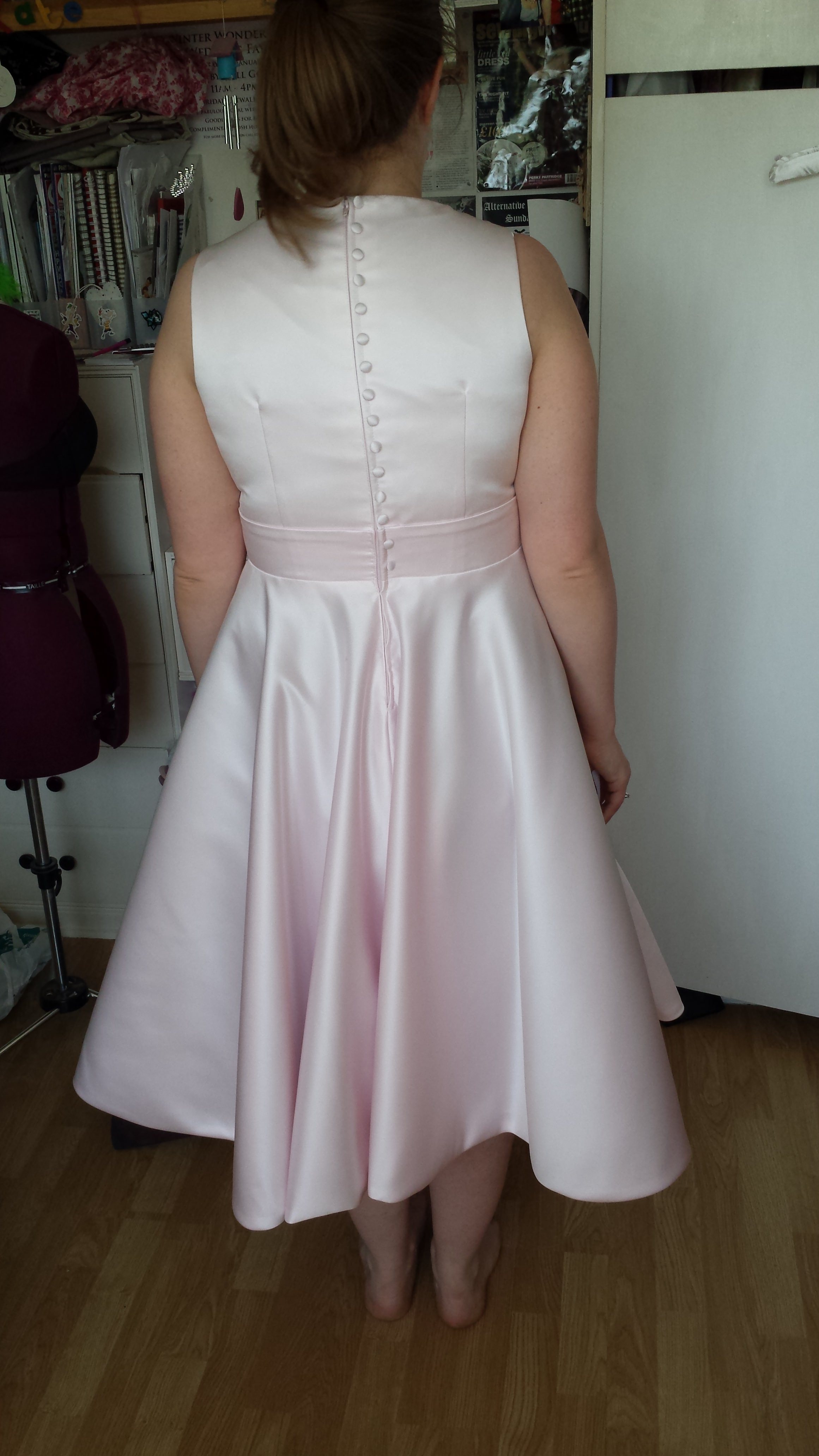 pale pink bespoke swing style wedding gown