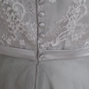 silver bespoke wedding gown with button detail
