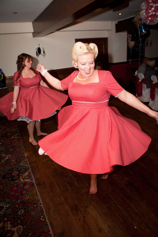 Red polka dot bespoke swing bridesmaid dresses
