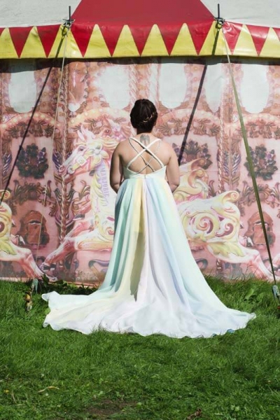Chiffon Grecian style wedding gown with pastel rainbow underlining