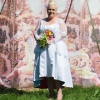 White high low wedding gown with rainbow lining and lace jacket