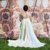 Chiffon Grecian style wedding gown with pastel rainbow underlining