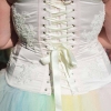 Pale pink corset with lace detailing and rainbow tulle skirt